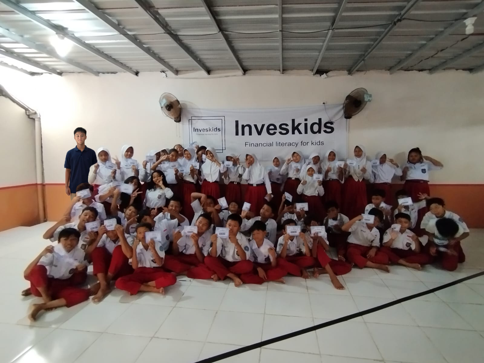 Read more about the article Distributing Early Education through Financial Literacy Books to Kuningan 03 Elementary School